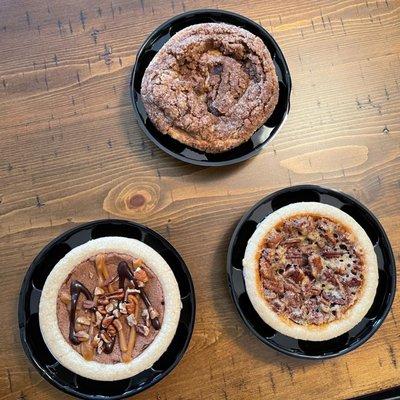 Granny Smith apple (top), caramel turtle - seasonal (bottom left), & Nana's pecan (right).