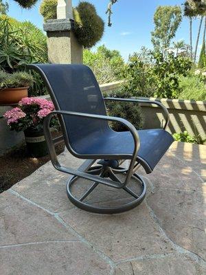 Refinished Tropitone captain's chair.