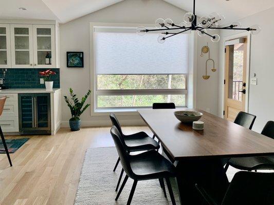 Hunter Douglas roller shades in dining room