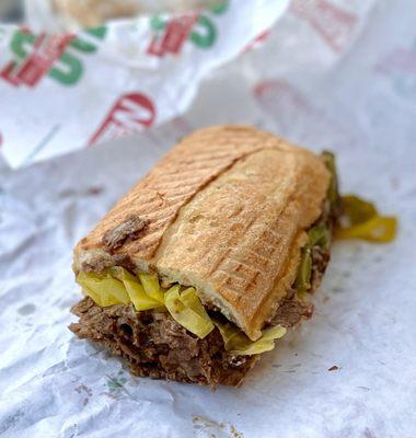 half steak & cheese sub with onions peppers and hot peppers, oddly underwhelming