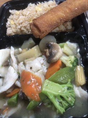 Chicken with fresh vegetables, fried rice and egg roll