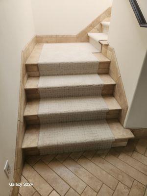 Stair runner over travertine