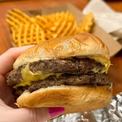 Cheeseburger and waffle fries