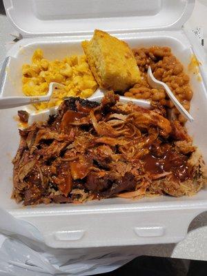 Pulled pork, brisket,  mac n cheese, baked beans and cornbread.