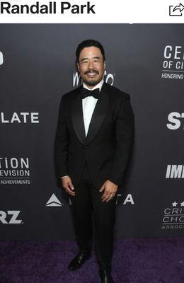 Actor and producer Randall Park in a custom black shawl lapel tuxedo for an awards show