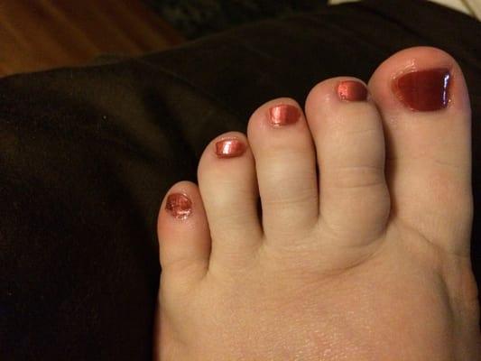 Pinky toe is already peeling and the other toes have clear coat all over the skin and she wouldn't clean it.