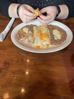 Cheese enchiladas and decried beans