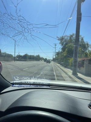 Driving  and they played soccer at the school and the ball fly over to my car broken my  mirror