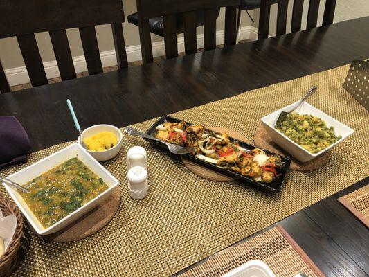 Left to right: Saag Dal, Salmon Amritsari Tikka, Navratan Korma.