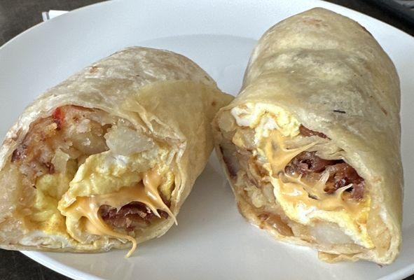 EGGS, CHEESE & HOME FRIES BREAKFAST BURRITO with bacon