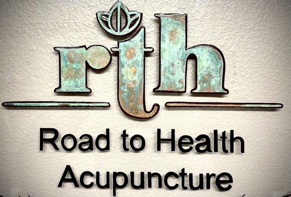 Our Road to Health Acupuncture sign