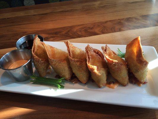 Jalapeño cream cheese wontons with maple honey glaze which are to die for.