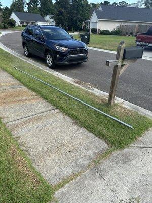 The garage door bar that the tech left outside my house and would not haul away.