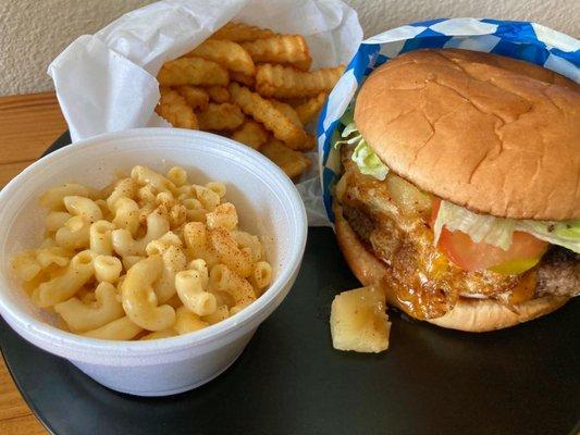 Mac and cheese, fries, cheeseburger with grilled pineapple and fried egg added