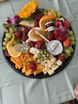 Cheese and fruit tray.