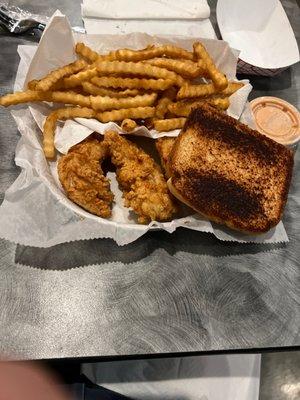 The Lil'O basket - 3 fingers, fries & drink at lunchtime. They over-did the toast, but otherwise good.