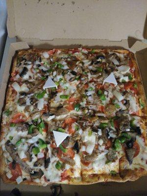 Silician pizza garbage style: pepperoni, meatball, sausage, Green Pepper, onion. We swapped the black olive for mushroom $20!