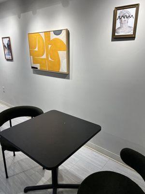 Seating area with art.