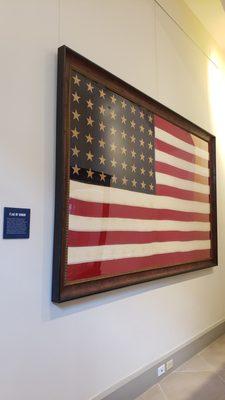 Texas Capitol Visitors Center with old US flag