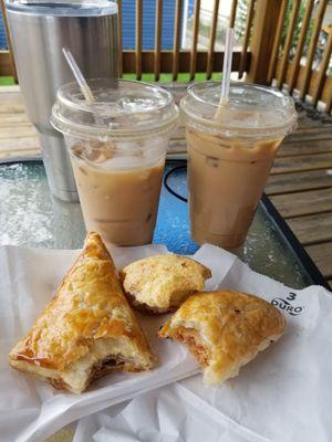 Iced cafe con leche, pan de bono chicharron, guava and cheese and chorizo pastries.