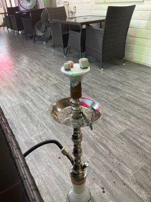 Hookah.  They have indoor and outdoor seating.  Also a smoke shop