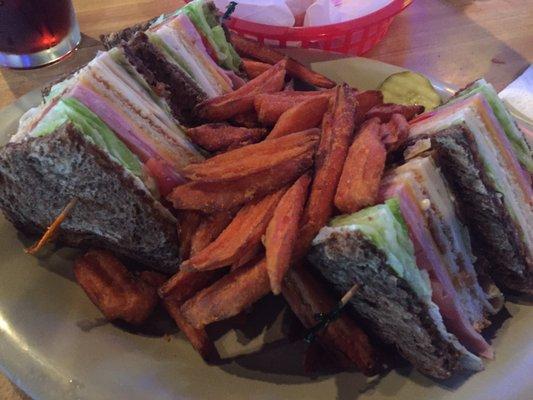 Club sandwich with sweet potato fries