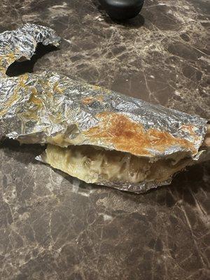 This is my chicken cheese quesadilla from Chipotle tonight. Was not able to eat it. It was completely stuck to the aluminum foil.