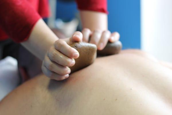 Hot stone massage is perfect way to melt away your stress!