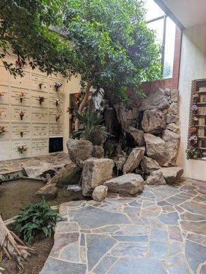 Mausoleum with beautiful waterfall