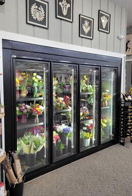 Our new cooler is full of hand-crafted fresh flower bouquets ready for you!