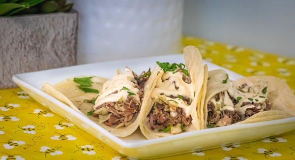 Kalua Pork Tacos - Smoked to Absolute Perfection.  Melt in your mouth Pork that pulls apart with the slightest touch.