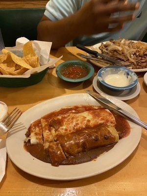 Burrito and Enchilada with salsa and Queso dip