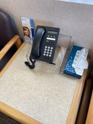 I am not exactly sure why there is a phone in the waiting room, but this is to let you know there is. :)