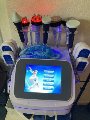 Body Contouring machine w cupping, cavitation, Radiofrequency, laser lipolysis pads, and ultrasound.