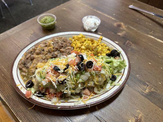 Pork Burrito with beans and fiesta corn.