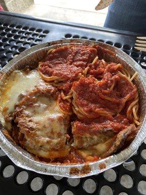 Eggplant Parmesan over pasta