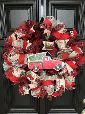 A wreath made by my wife. Many of the items on this wreath were purchased at Hobby Lobby.