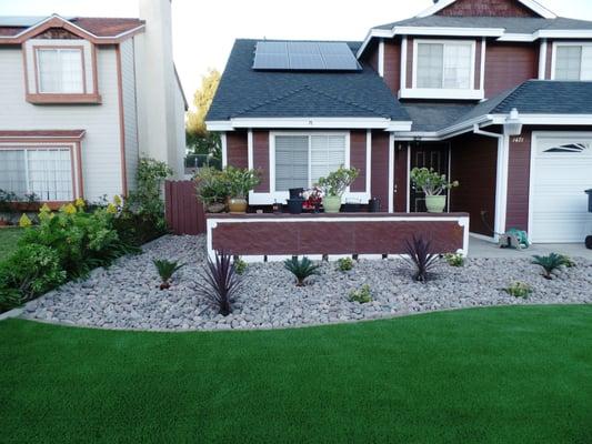 Landscaped entire front yard.