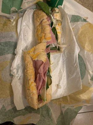 Smashed and torn sandwich.