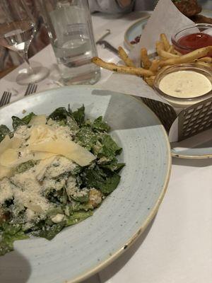 Caesar salad and fries