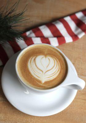 Gingerbread Eggnog Latte: a creamy latte with gingerbread, eggnog, and cinnamon.