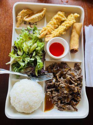 Bento 2 With Beef teriyaki, tempura shrimps, egg roll and gyoza, garden salad