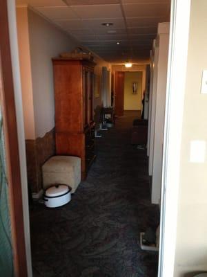 Hallway of massage rooms.