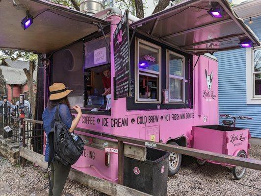 Cute and very pink truck serving up fresh mini donuts