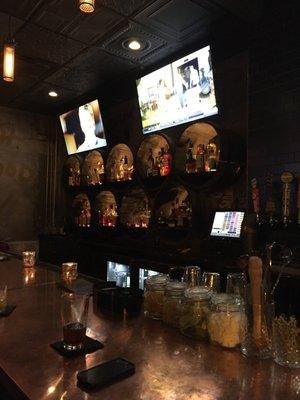 The bar backdrop made of barrels, nice!