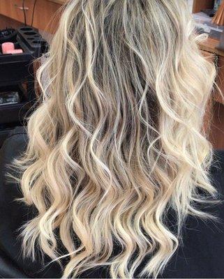 Summer blond look with full highlight base.