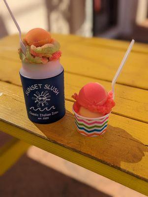 Rainbow slush in koozie and small sunset slush