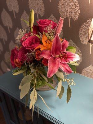 Birthday arrangement of lilies and beautiful big, fragrant roses.