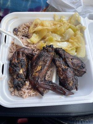 Jerk wing dinner with cabbage and rice with Rice & Peas