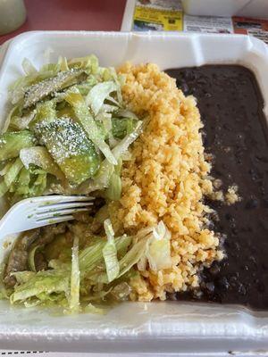 Beef enchiladas with rice and beans.